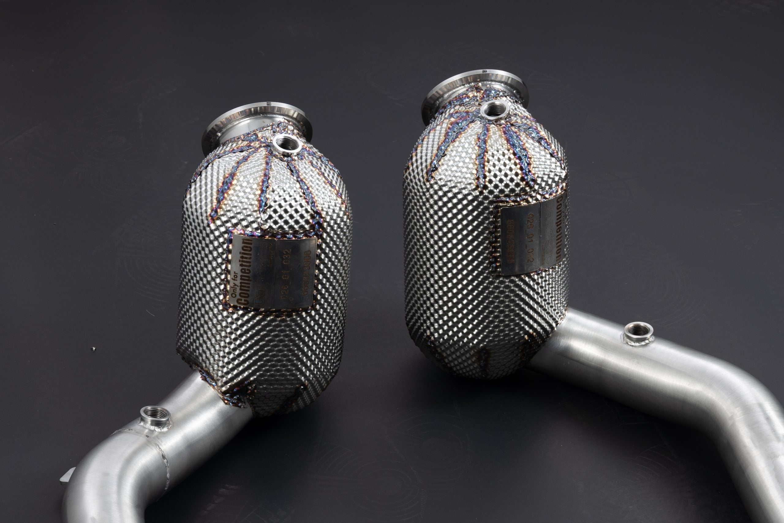 Ferrari Roma Capristo downpipes shown as a pair with outlet pipes