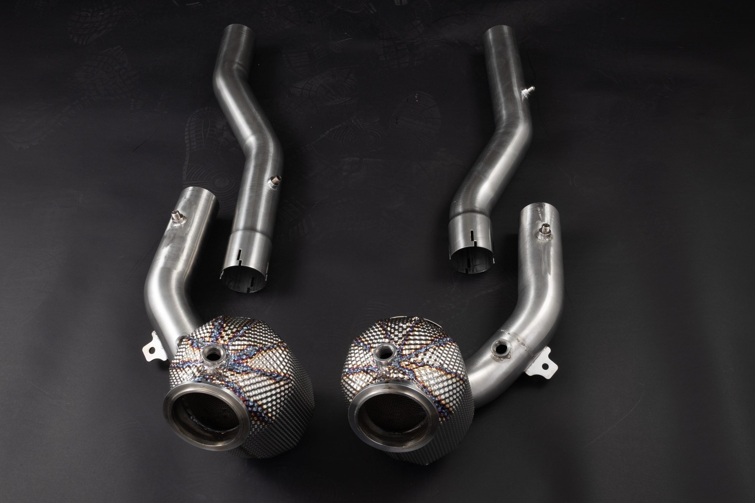 Capristo Roma sport cat downpipes arranged left and right with outlet pipes
