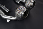 Close-up of heat-wrapped sport cat inlet and mounting tab, Ferrari Roma