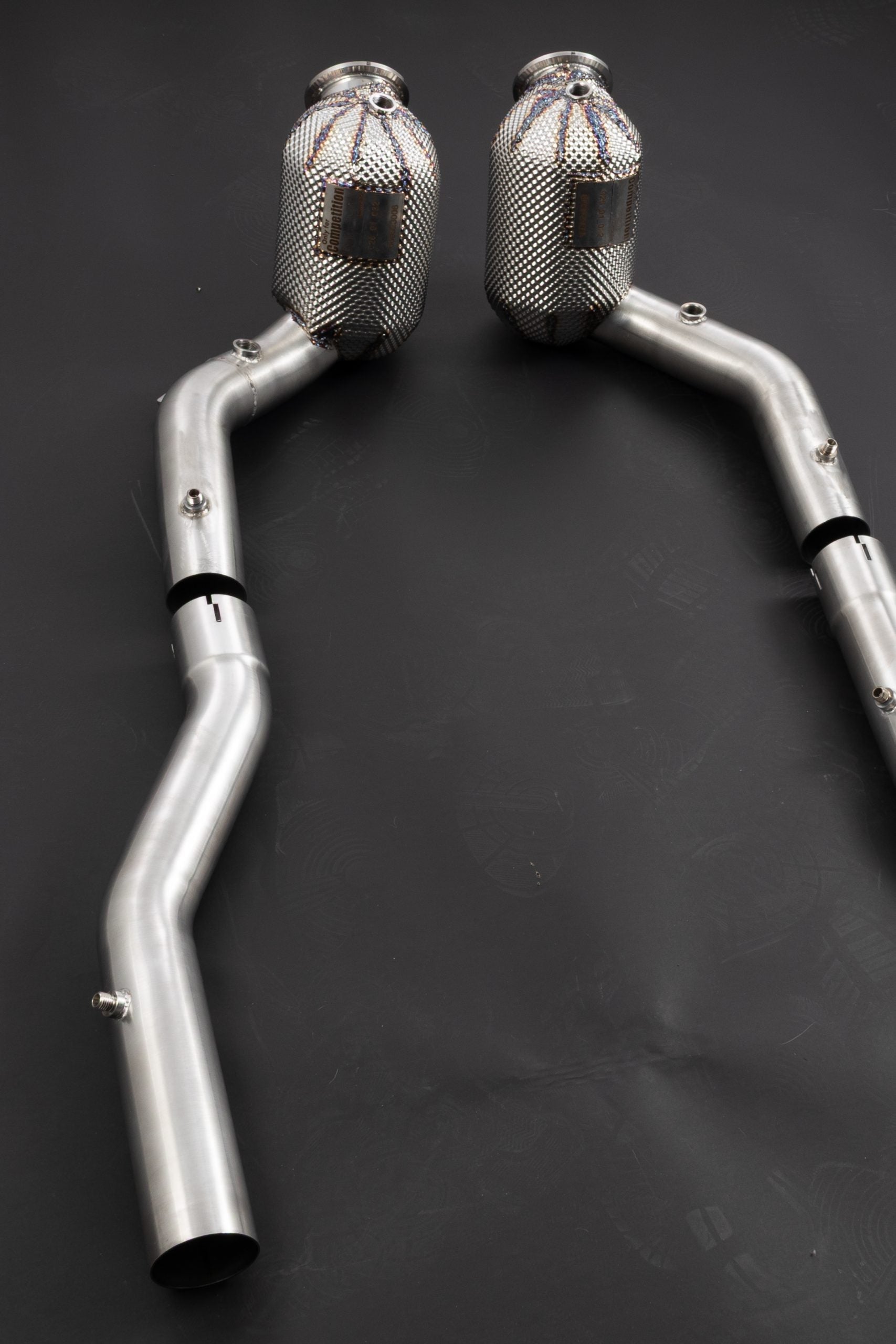 Ferrari Roma Capristo downpipes with clamps fitted to the connecting pipes