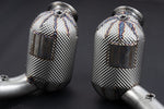 Heat-protected sport cat housings with V-band inlets and sensor bungs, Ferrari Roma