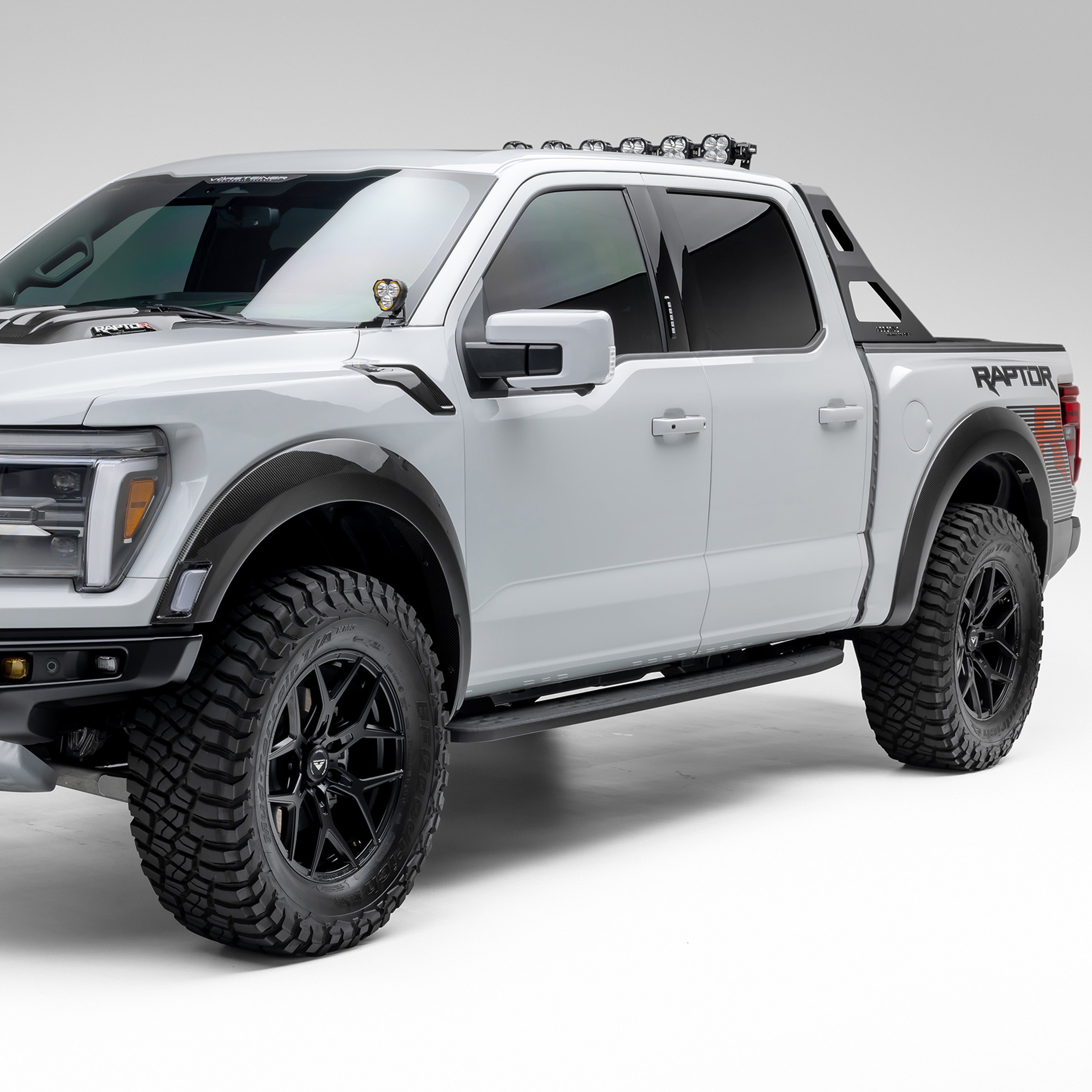 White Raptor R with Vorsteiner carbon flares, front 3/4 view