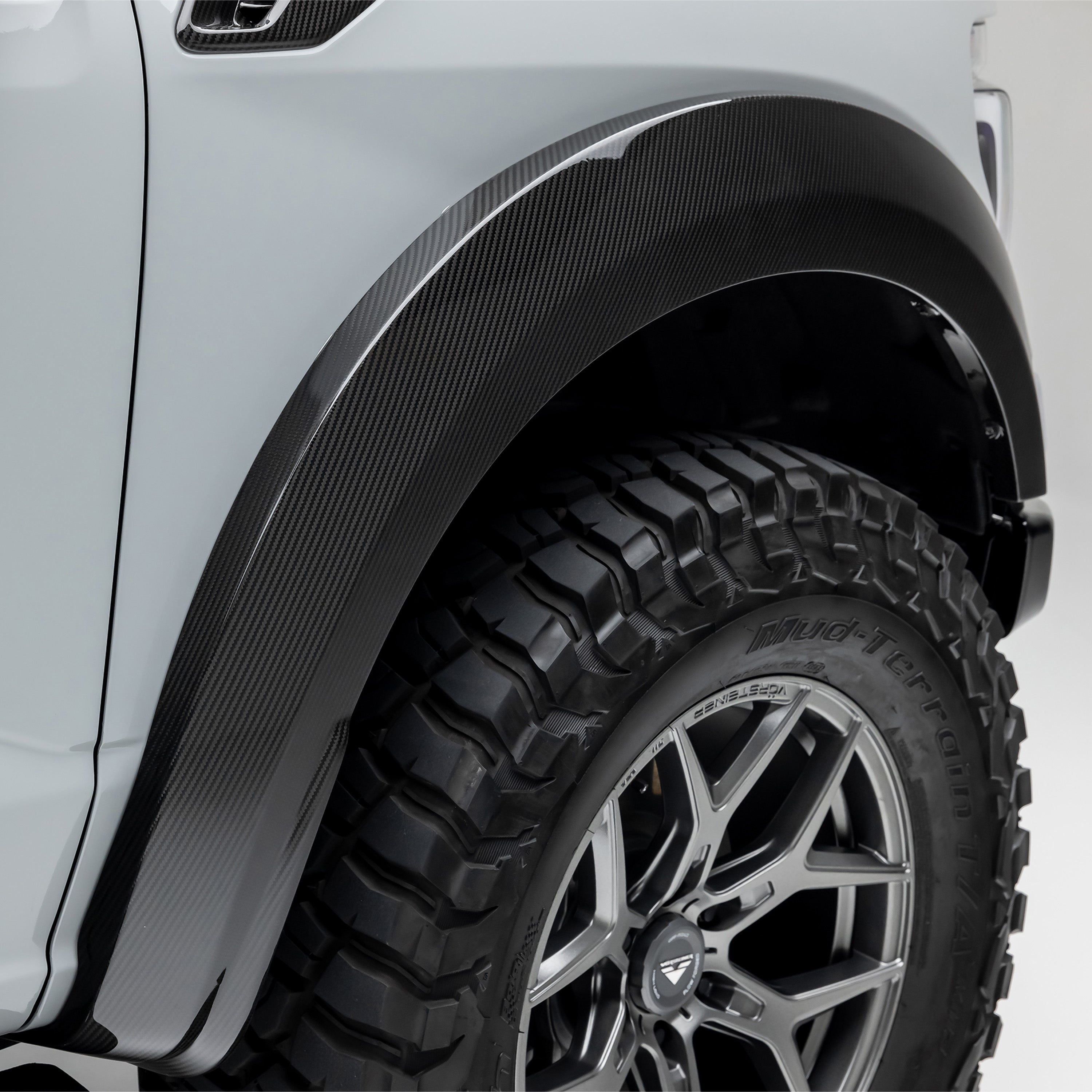 Raptor R front fender flare over off-road tire, side detail