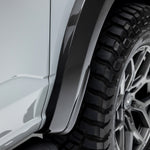 Carbon fender flare edge on Raptor R, angled close-up