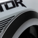 2x2 carbon weave on Raptor R fender flare, macro shot