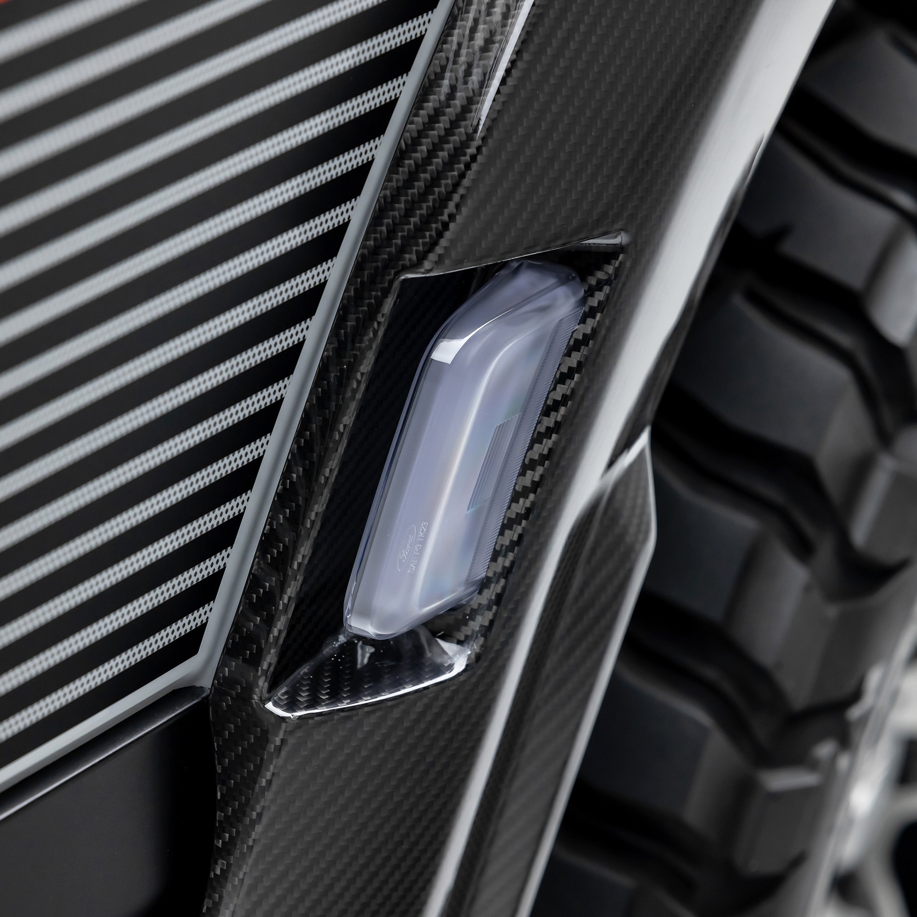 Raptor R flare with marker light, carbon close-up