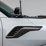 Carbon fender side vent on white Ford F-150 Raptor R, side close-up