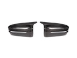 A front view of AUTOTECKNIC M-INSPIRED CARBON FIBER MIRROR COVERS - BMW G22 4-SERIES 2020+ with white background