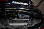 Capristo valved exhaust installed under BMW M3 G80, black quad tips