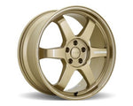 A front view of Volk Racing TE37 Ultra M-Spec Wheel 20x10 5x114.3 30mm Gold with white background