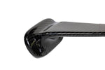 Close-up view of carbon fiber mirror arm showing detailed weave pattern and curved aerodynamic shape - APR Performance aero mirror for Scion FRS BRZ GT-86