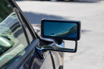 Carbon fiber framed rectangular side mirror with blue tinted glass mounted on green sports car door - APR Performance aero mirror for Scion FRS BRZ GT-86