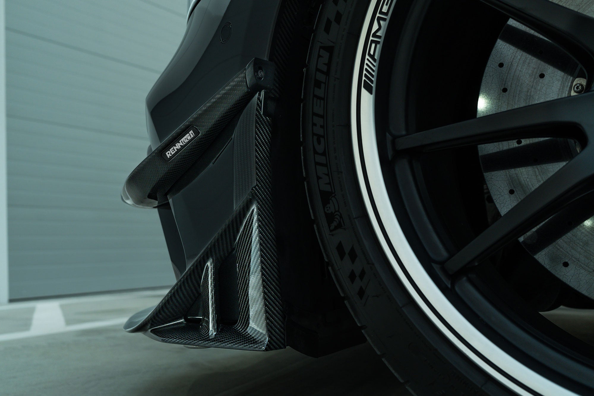 X290 canard fitted beside the front wheel - Carbon Fiber Canards for the 2019-2026 AMG GT 63 4-Door Coupe