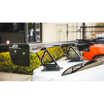 A back close up view of APR Performance 60.5" GTC-200 Adjustable Wing Subaru WRX 2022+ fitted on a white car