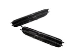A top view of both of the AUTOTECKNIC REPLACEMENT GLAZING BLACK FENDER GILLS - BMW E60 M5 SEDAN / E61 M5 WAGON 2005-2010 with white background
