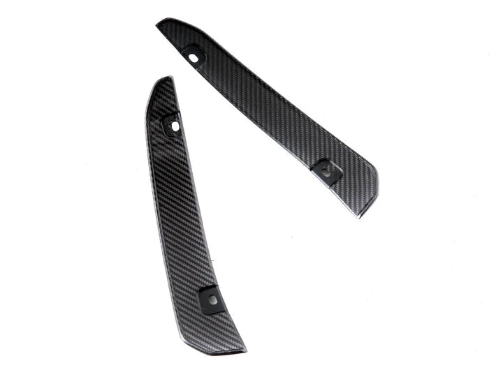 A side top view of AUTOTECKNIC CARBON FIBER REAR SPLASH GUARDS - BMW F97 X3M | G01 X3 2018+ with white background