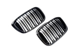 A front view of AUTOTECKNIC PAINTED DUAL-SLAT GLAZING BLACK FRONT GRILLE SET - BMW G01 X3 | G02 X4 PRE-LCI 2017-2022 with white background