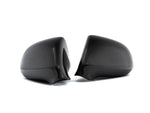 A front view of AUTOTECKNIC REPLACEMENT DRY CARBON MIRROR COVERS - HONDA S2000 1999-2009 with white background