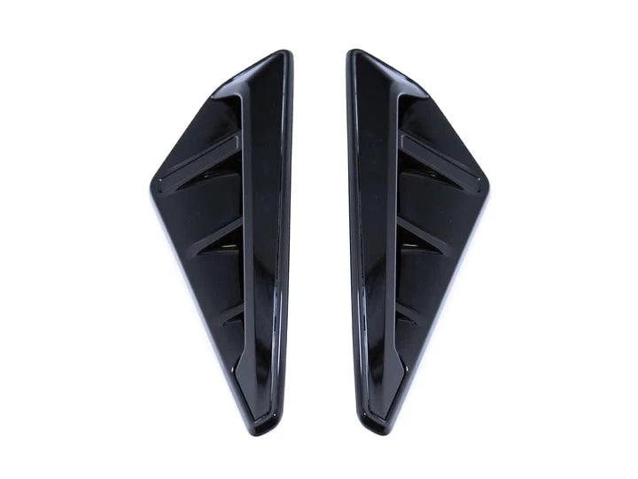 A top view of AUTOTECKNIC GLAZING BLACK FENDER TRIM SET - BMW F95 X5M | G05 X5 2018+ with white background