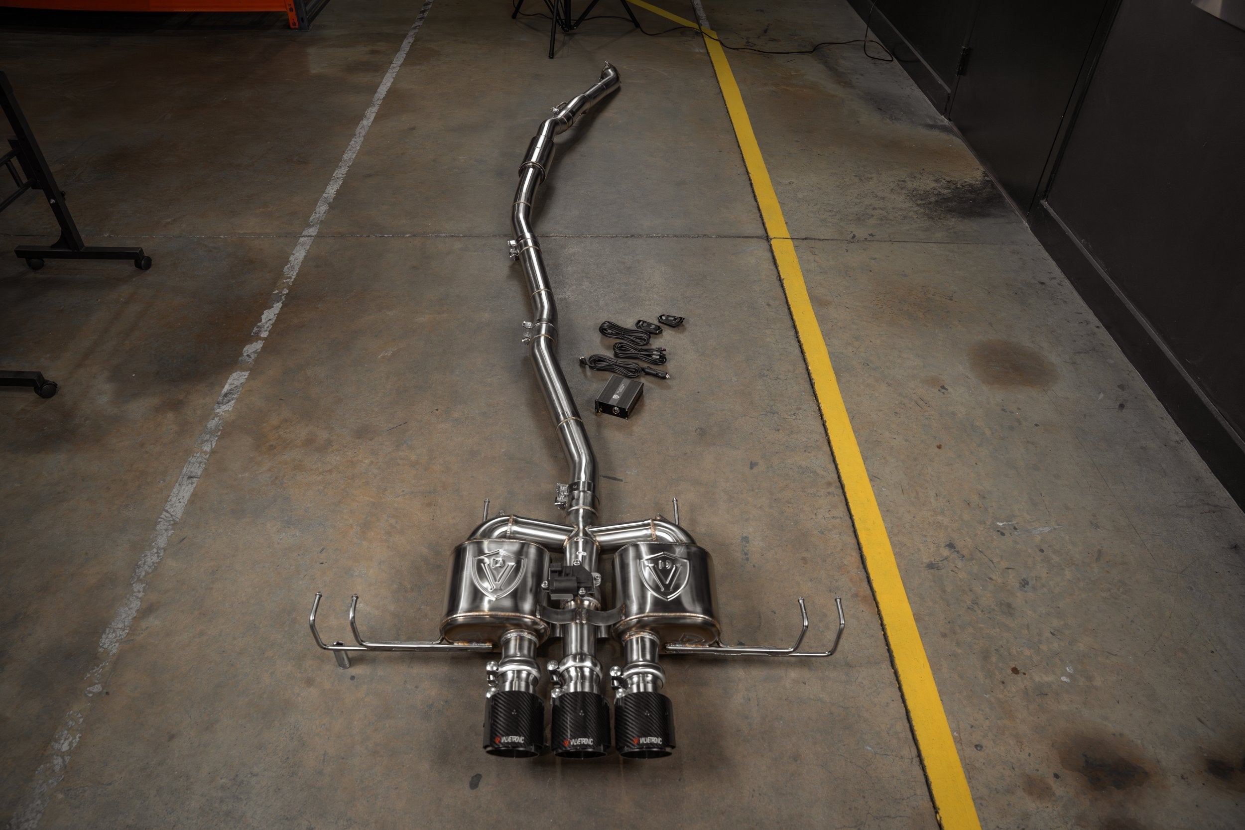 Valvetronic Designs Valved Exhaust Civic Type R / Integra Type S manufacturer gallery: complete cat-back viewed lengthwise with tips in the foreground