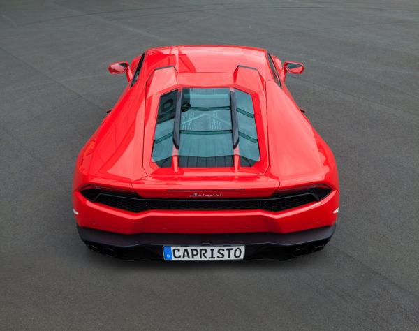 wide top view of Capristo Carbon Engine Bonnet/Hood (With Scoops) Matte for Lamborghini Huracan 2014-2019 fitted inside a red car