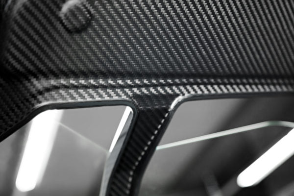 close view of wide top view of Capristo Carbon Engine Bonnet/Hood (Matte) for Lamborghini Huracan 2014-2019 fitted inside a car with black background