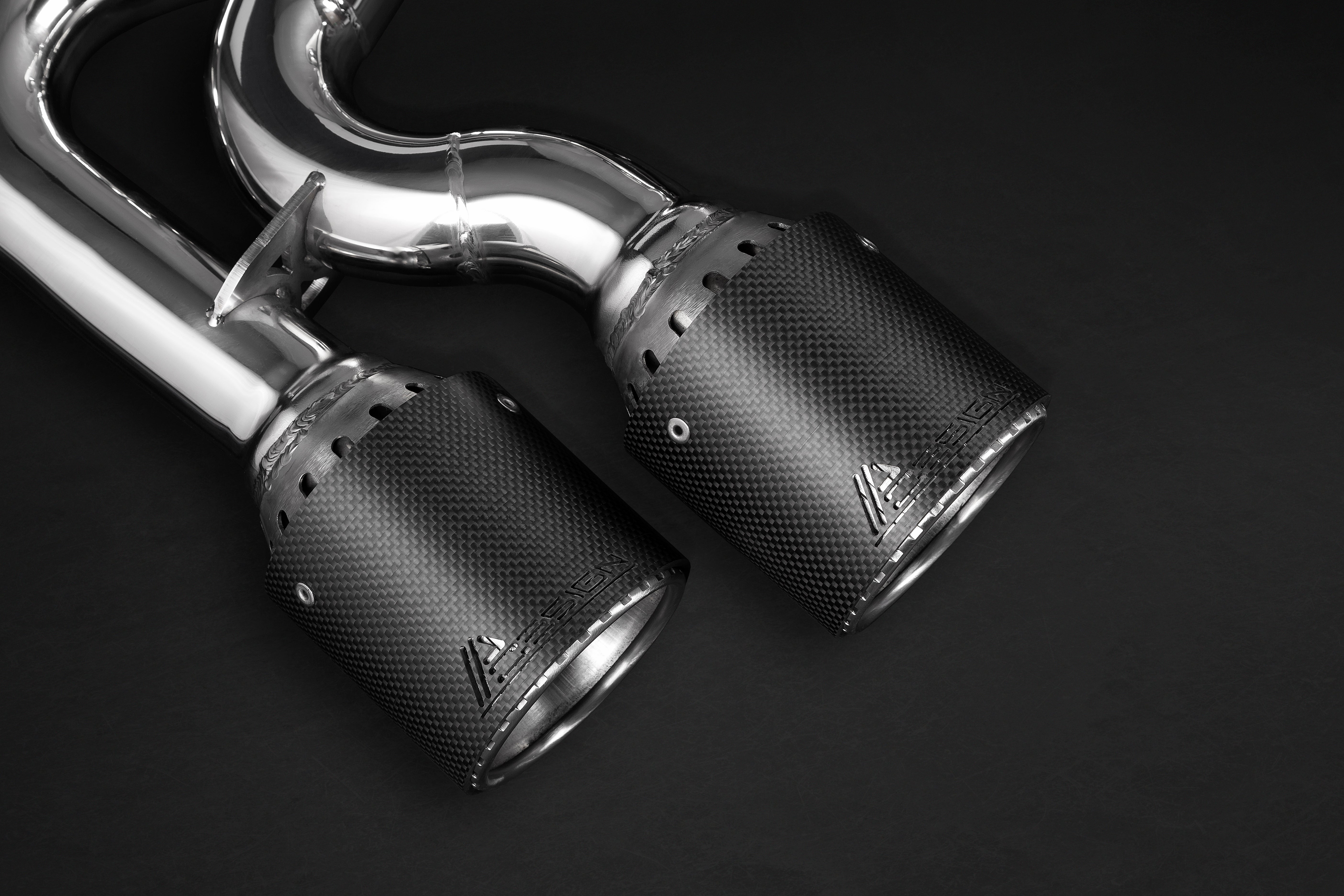 Close-up of Capristo carbon fiber tailpipes on the Giulia Quadrifoglio exhaust