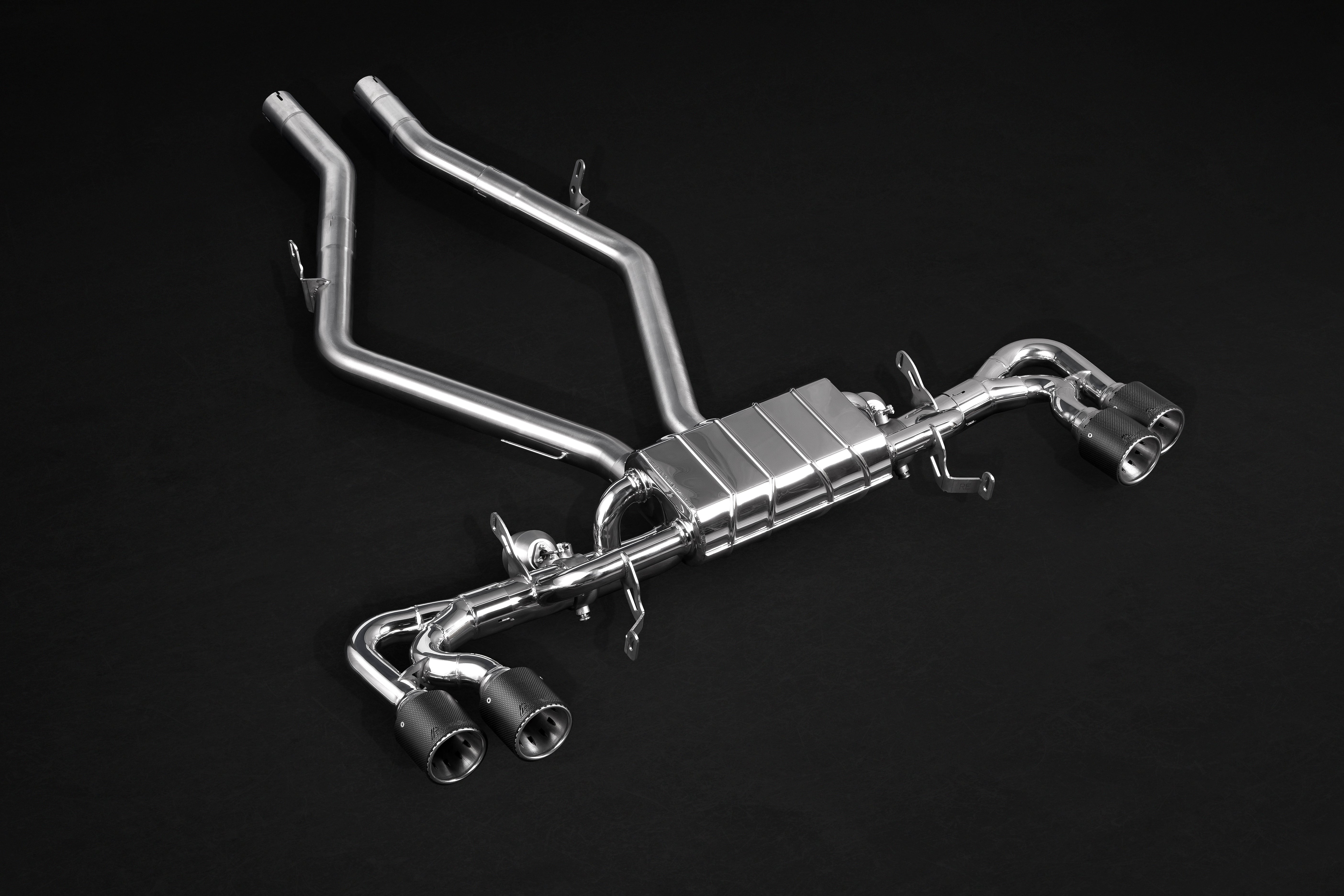 Giulia Quadrifoglio Capristo valved exhaust with carbon quad tips, angled view