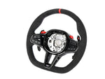 A front view of AUTOTECKNIC G8X LCI ALCANTARA STEERING WHEEL - BMW G8X M2/ M3/ M4 2020+ with white background
