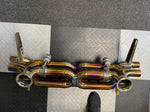 A top view of Valvetronic Designs Valved Sport Exhaust System (for Audi R8 V10 / Lamborghini HuracanF1) on the ground.