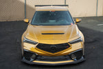 A front wide view of APR Performance Carbon Fiber Aero Kit for Acura DE5 Integra Type S 2024+ fitted on a golden car outside on the ground