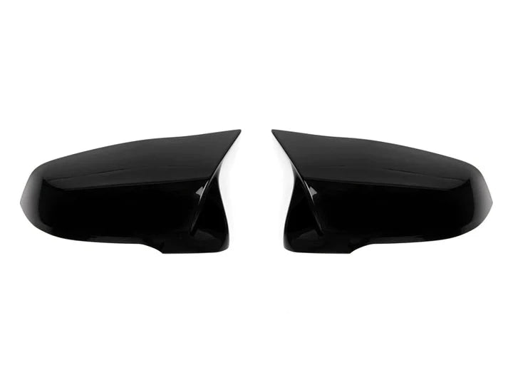 A front view of AUTOTECKNIC M-INSPIRED PAINTED MIRROR COVERS - BMW F40 1-SERIES | F44 2-SERIES GRAN COUPE 2019+ with white background