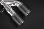 Close-up of Capristo carbon fiber round tips for BMW M5 F10