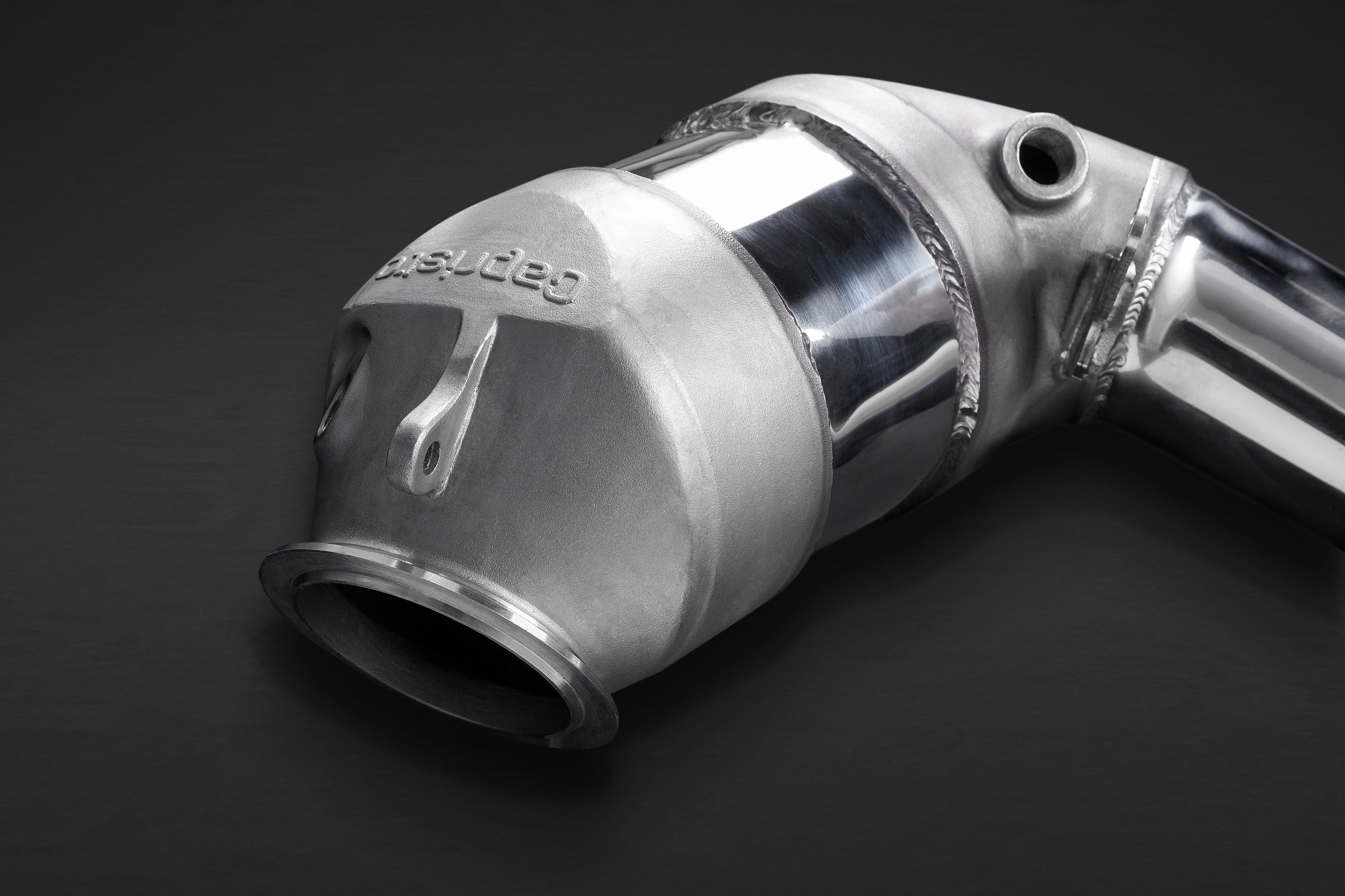 Close-up of a Capristo sport cat housing with logo and V-band flange for the BMW M5 F10 / M6