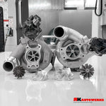 A close up view of RK Autowerks S58 STAGE 2 TURBO UPGRADE – M3 M4 G80 G82 G83 – X3M X4M F97 F98 on a white table