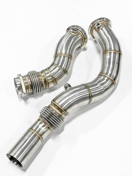 A top view of RK Autowerks F80 F82 M3 M4 CATLESS DOWNPIPES with a white background