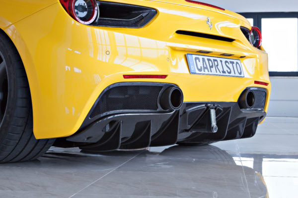 wide view of Capistro Carbon End Pipe Shells (Matte) for Ferrari 488 GTB / GTS 2015-2019 fitted inside a car