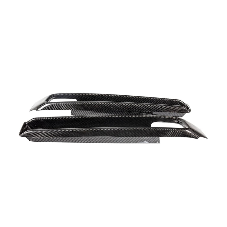 A front view of Urban Automotive Carbon Fiber Intake Trims Mercedes-Benz G Wagon 2018+ with white background
