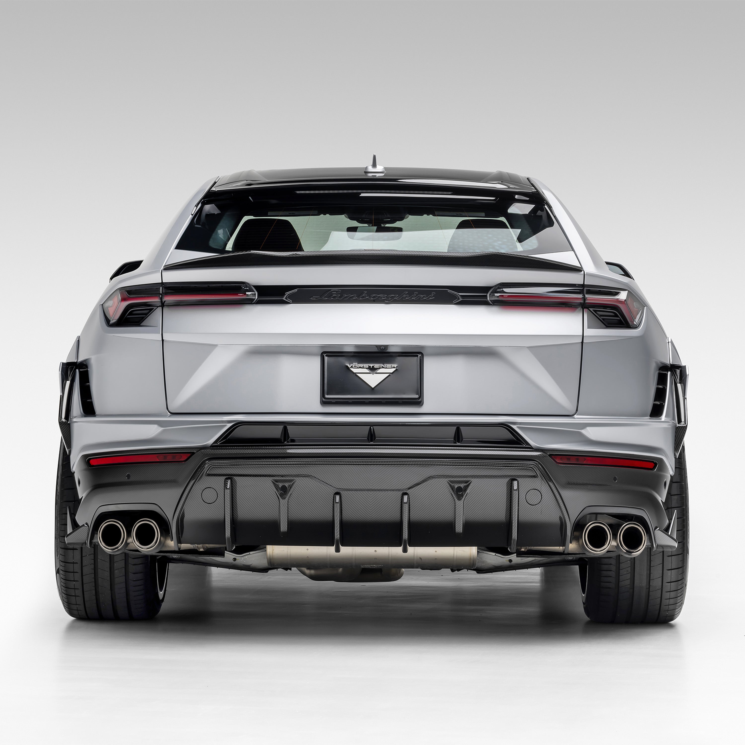 Grey Urus Performante with rear diffuser, straight rear view