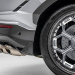 Carbon side fin above Urus exhaust, rear quarter close-up