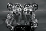 Capristo Murcielago LP640 race exhaust with headers, front view of polished collectors and mufflers