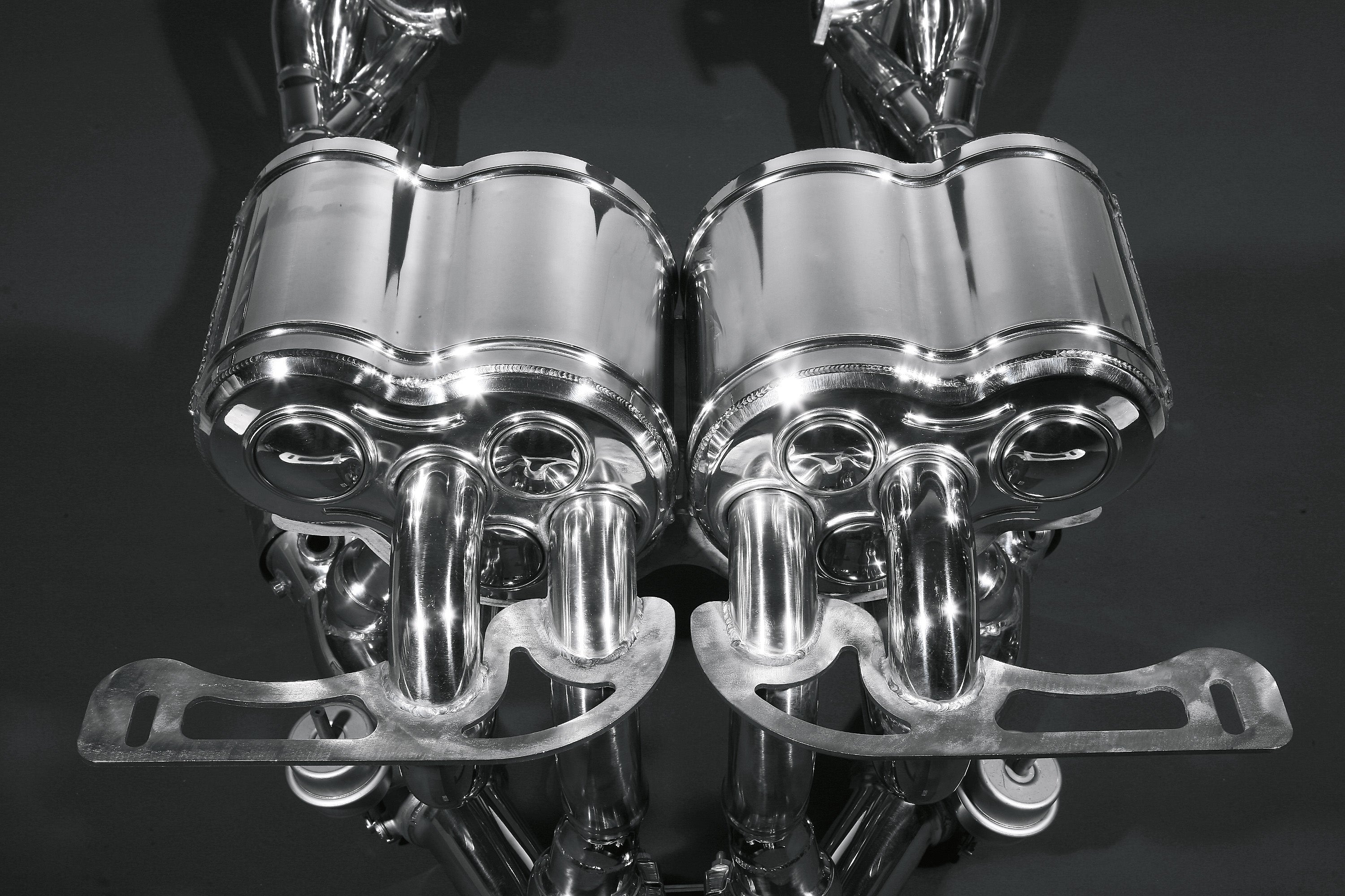 Capristo LP640 race exhaust mufflers with mounting brackets, polished stainless