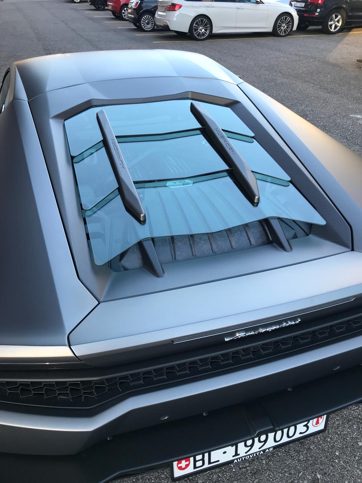 Matte grey Lamborghini Huracan with Capristo carbon and glass bonnet, no scoops