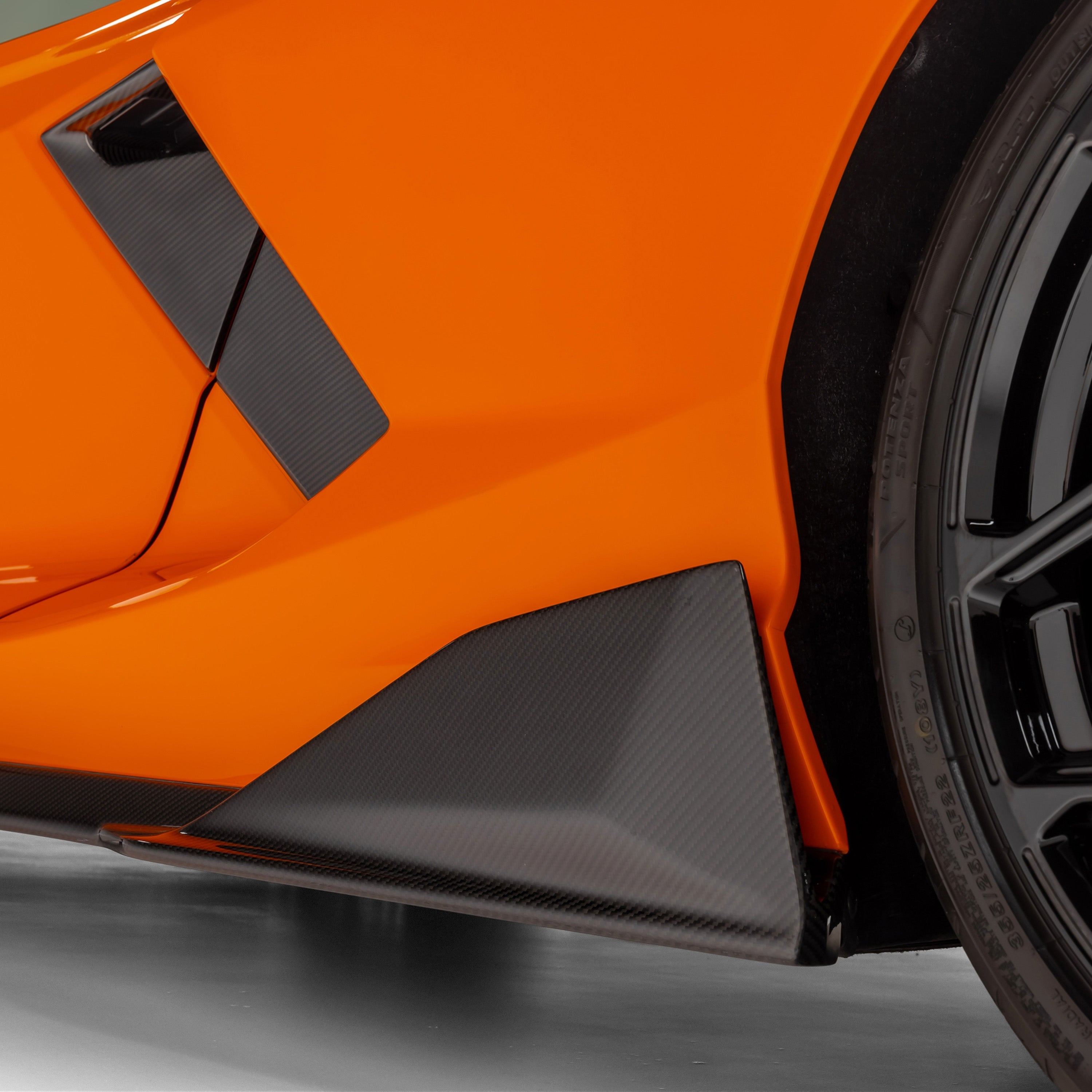 Revuelto side skirt and intake, angled close-up