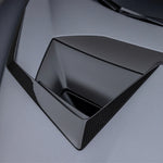 A side close up view of Vorsteiner Aero Hood Ducts Carbon Fiber for Lamborghini Huracan STO 2021-2025 fitted on a car