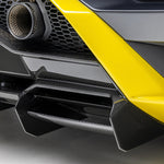 A back close up view of a car fitted with Vorsteiner Aero Rear Diffuser Carbon Fiber for Lamborghini Huracan STO 2021-2025 