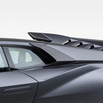 A side close up view of a car fitted with Vorsteiner Aero Side Intakes Carbon Fiber for Lamborghini Huracan STO 2021-2025 with white background