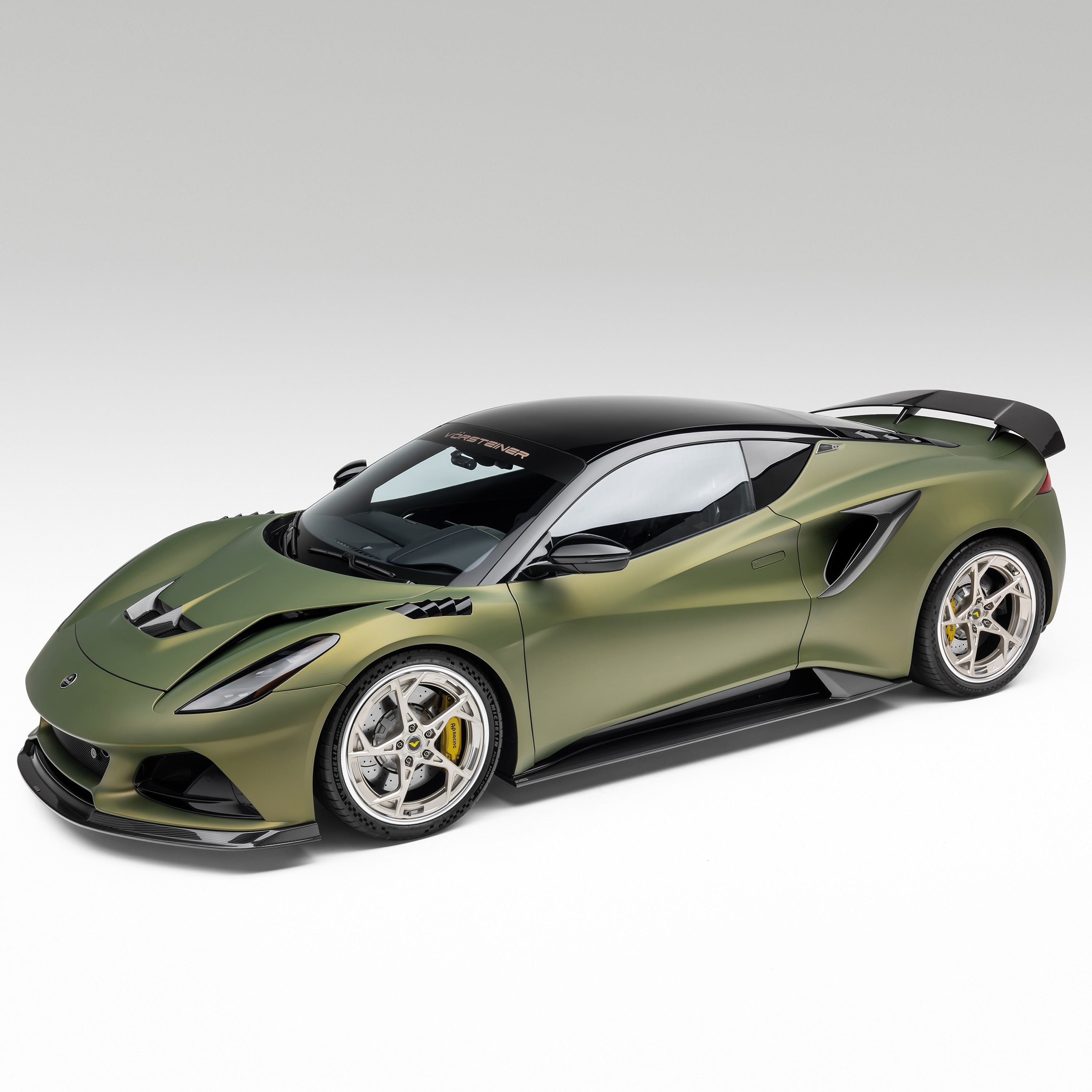 Lotus Emira with front spoiler, high front 3/4 of car