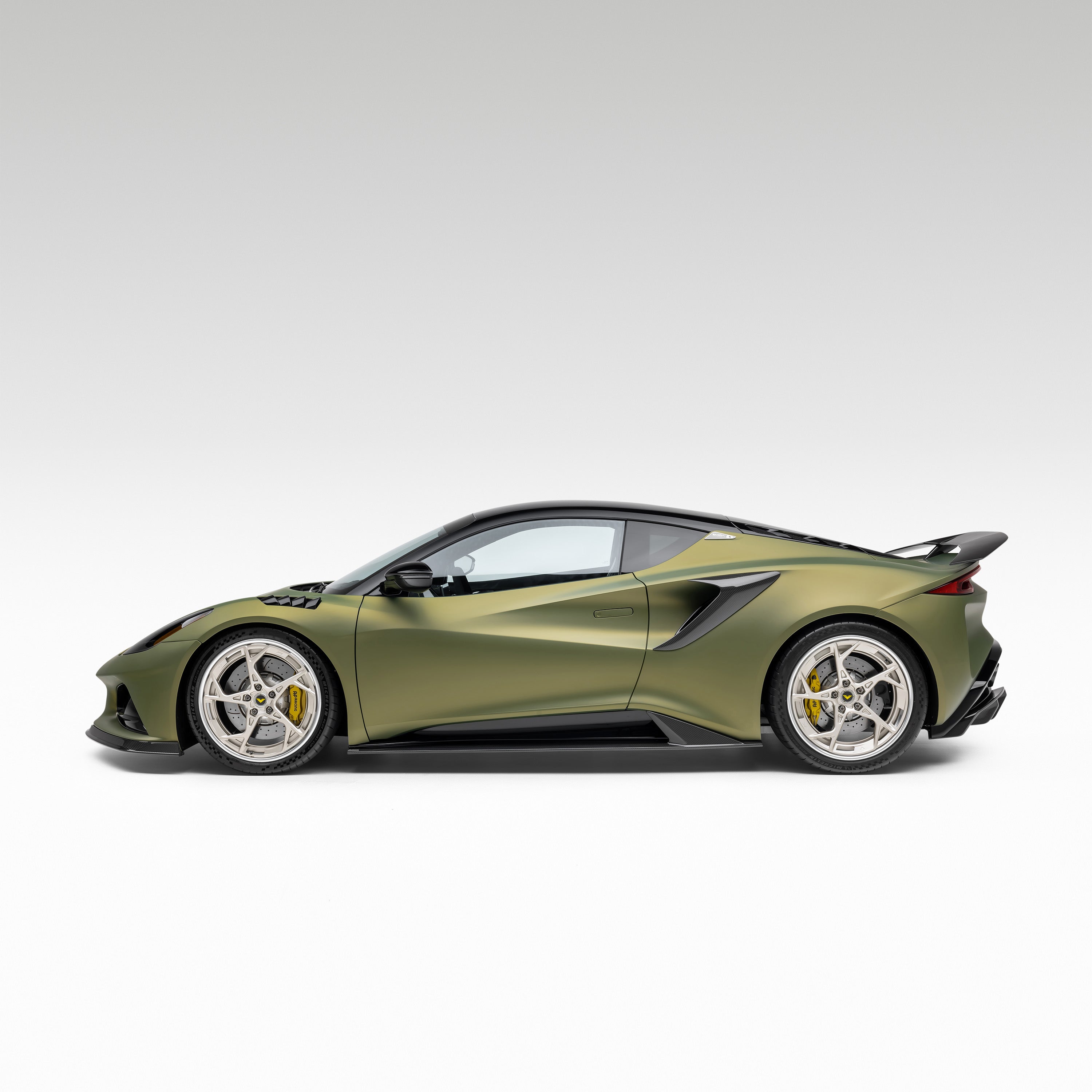 Green Emira with LR-52 front spoiler, full side profile