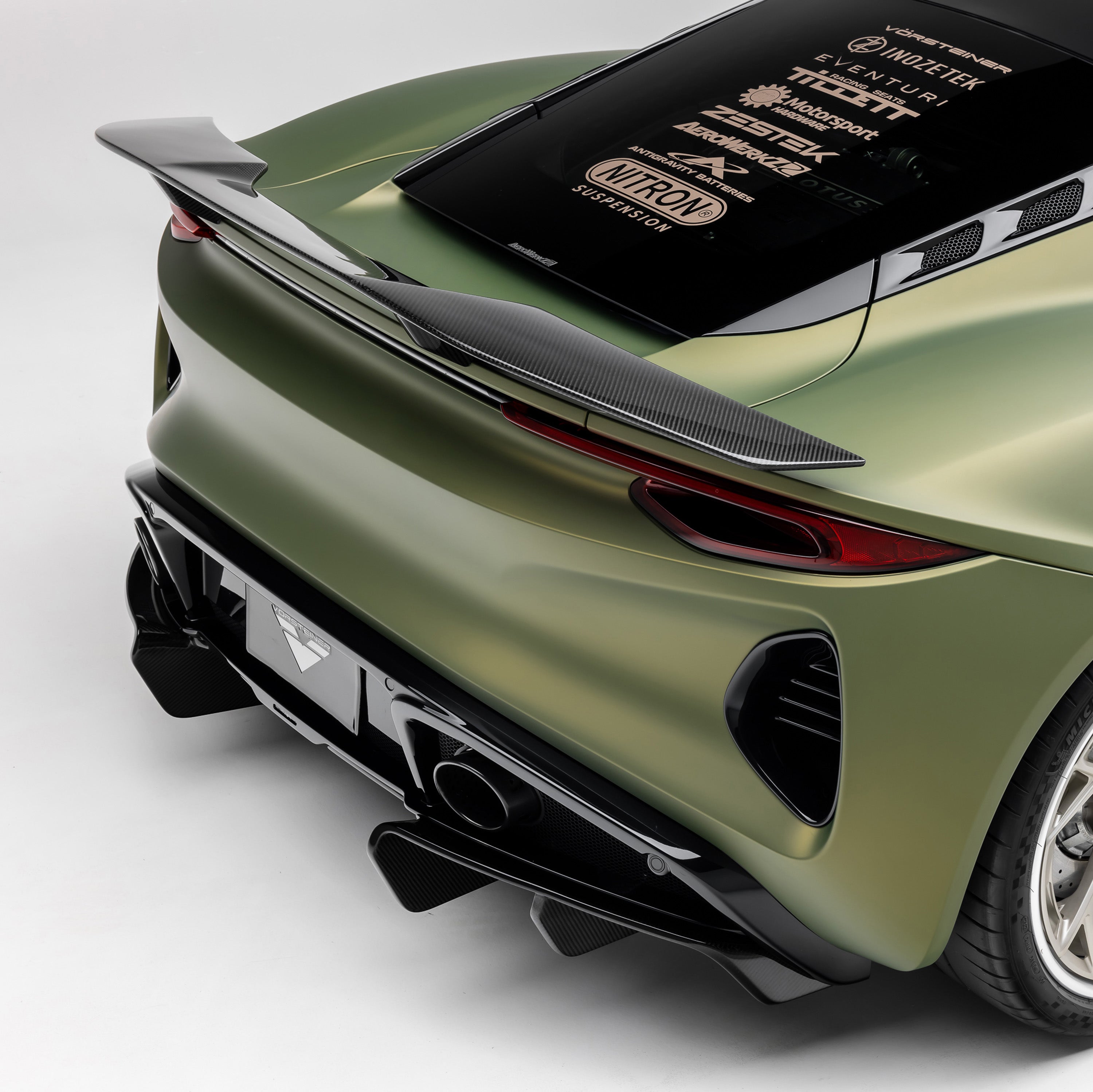 Emira diffuser and rear bumper, high rear 3/4 view